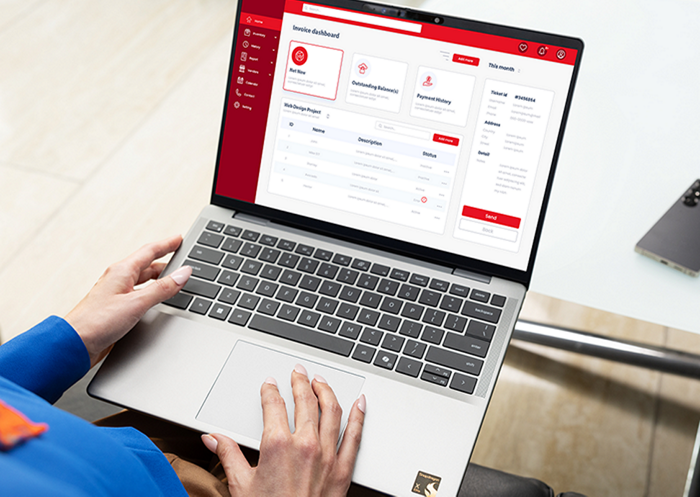 Person using an X series powered laptop with an invoice dashboard indicating business performance, reliability, and efficiency.