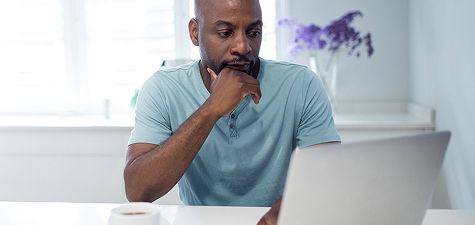 Man working on laptop computer
