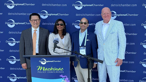 DTE Executives and dignataries at Mackinac conference podium