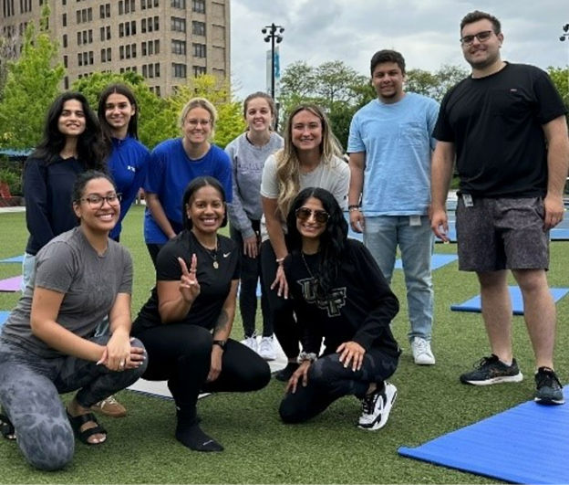DTE Employees gathered together at Beacon Park in Detroit engaged in a field activity