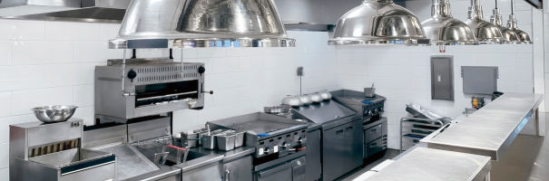 View of an industrial kitchen and counter for a restaurant setting