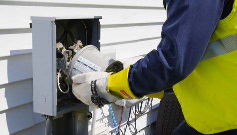 Technician installed Surge Protection Plus meter on home