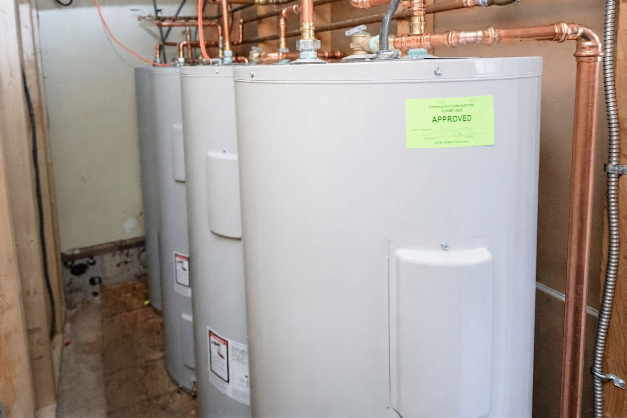 Row of commercial hot water tanks