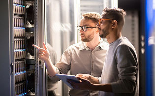 Two men working in data center