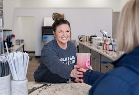 Woman serving ice cream