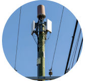 Close up of antennas on utility pole.