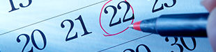 Red pen circling calendar day of 22nd