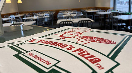 Closeup of pizza box from Papanos Pizza in Beulah