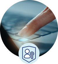 Person using a fingerprint reader on a laptop with a passkey icon indicating secure sign-in.