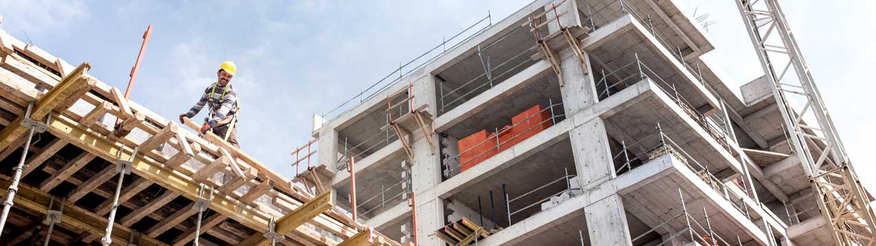 Construction worker on top of a building