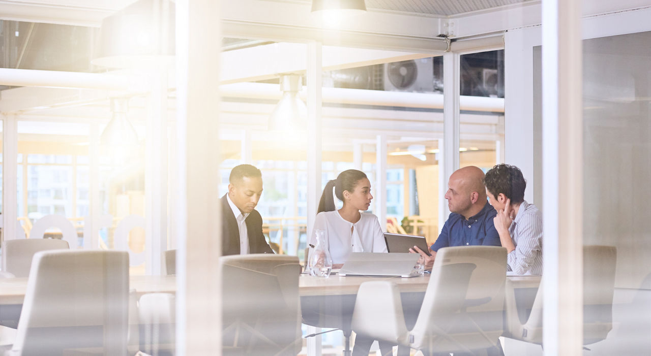 business meeting in office, hiring challenges in insurance, Insurance BPS | DXC Technology Insights