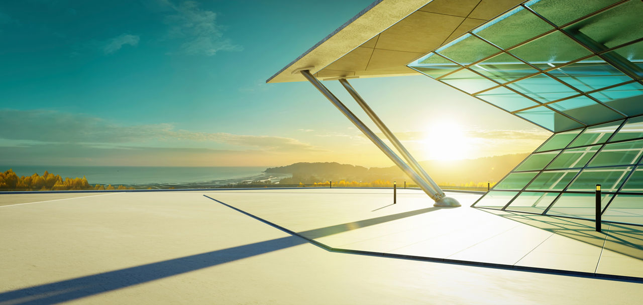 View of ocean and village from rooftop, Network | DXC Technology Customer Story