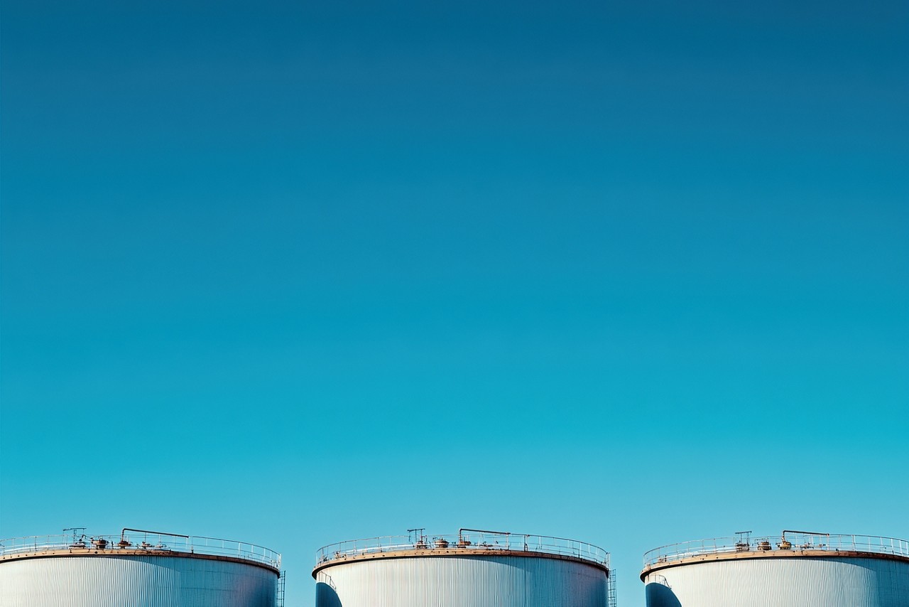 Oil tanks equipped with sensors enable real-time monitoring and data collection, showcasing the impact of oil and gas technology solutions | DXC Technology