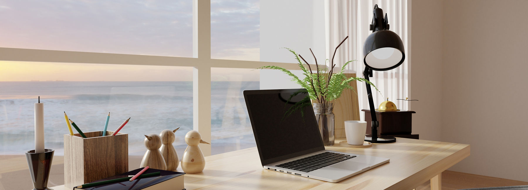 laptop, book, light on desk, Modern Workplace | DXC Technology Insights