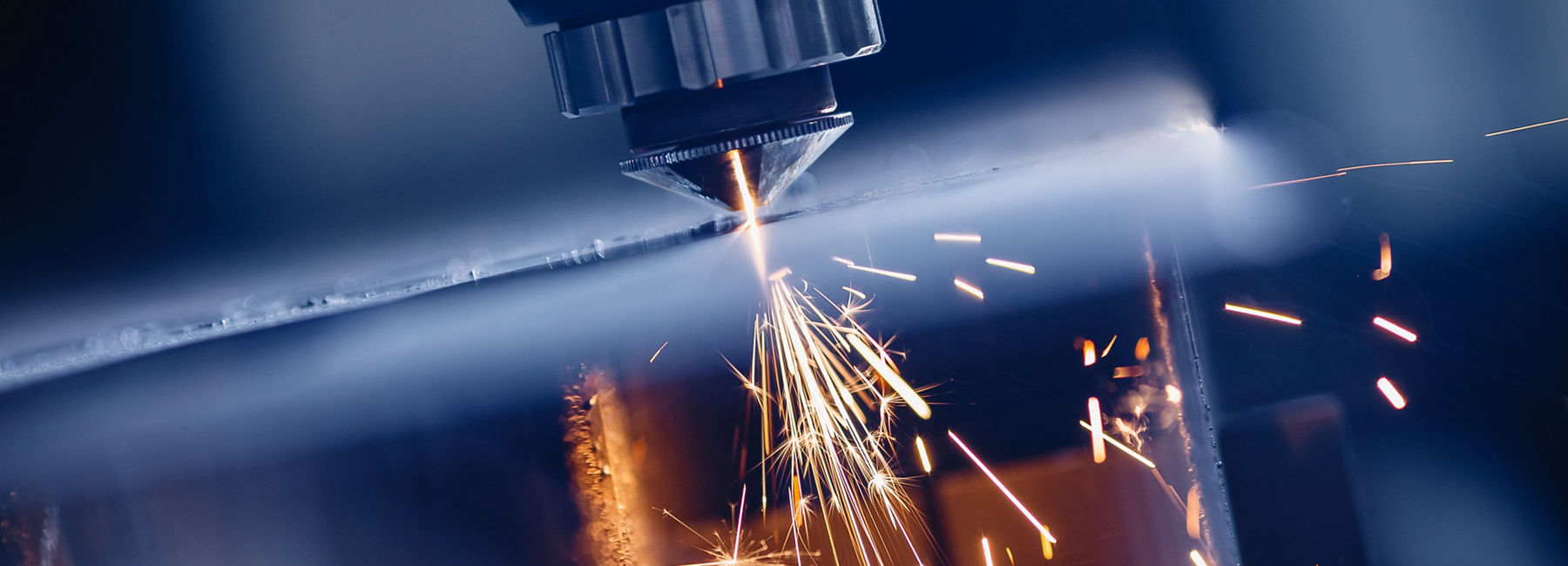 Industrial machine in motion, reflecting the zero-trust approach in manufacturing where no access is assumed to be safe by default | DXC Technology Insights