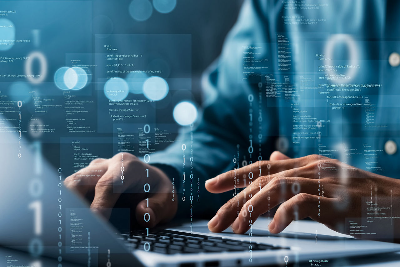 Person working on laptop with multi-factor authentication securing identity verification, Zero trust solutions | DXC Technology