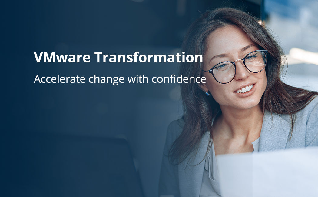 Woman discussing VMware transformation, VMware Transformation | DXC Technology