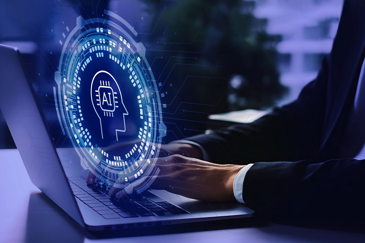 Man types on laptop keyboard, overlaid by graphic illustrating tech support via AI, Support Services | DXC Technology