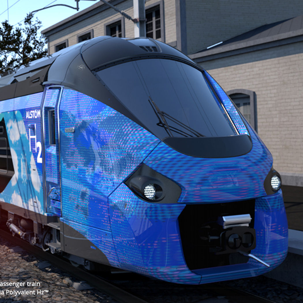 Train passing buildings as it goes down tracks, Cloud Advisory Services | DXC Technology Customer Story