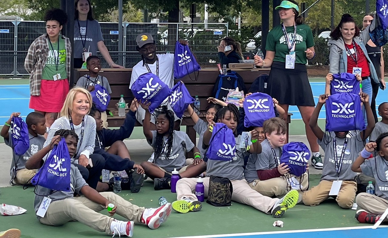 Ray August with players at Credit One Charleston Open