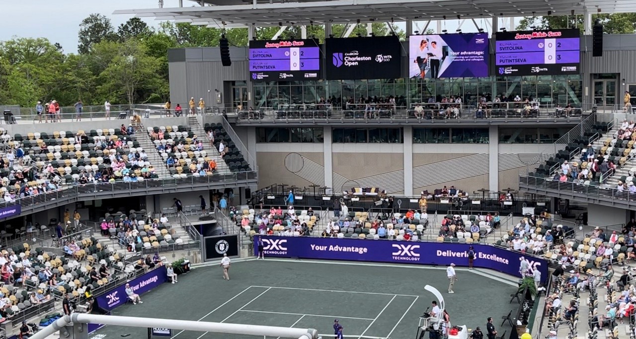 Ray August with players at Credit One Charleston Open