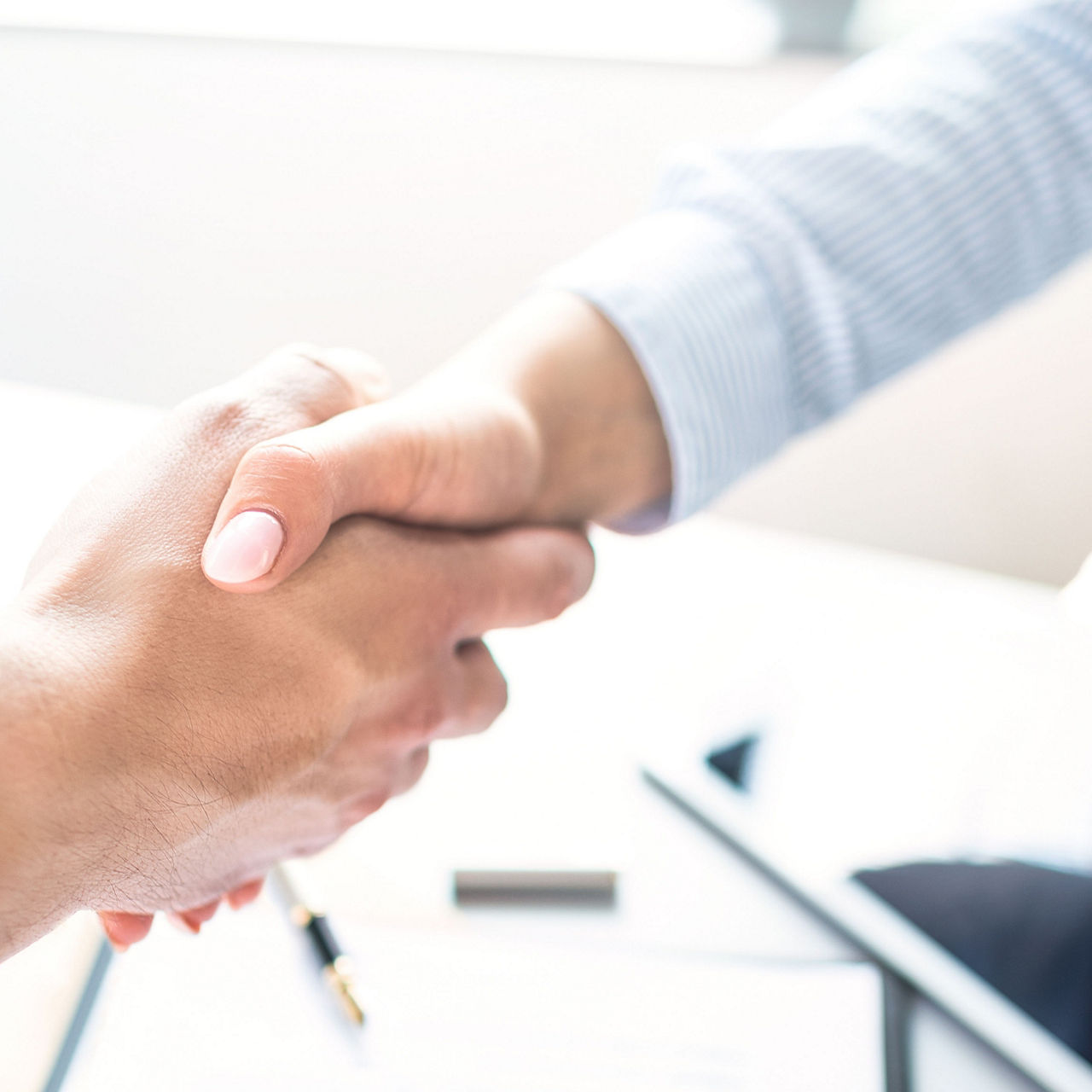 people shaking hands, IBM | DXC Technology