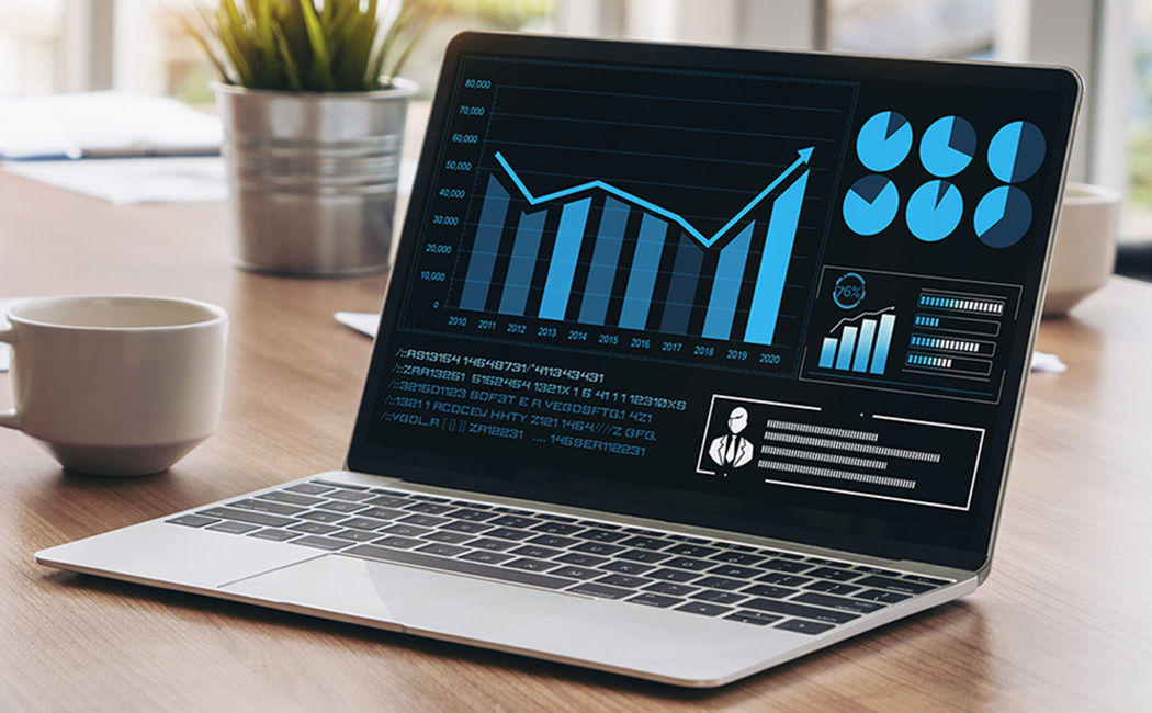 laptop showing stats, AI in the insurance industry, Banking BPS | DXC Technology Insights