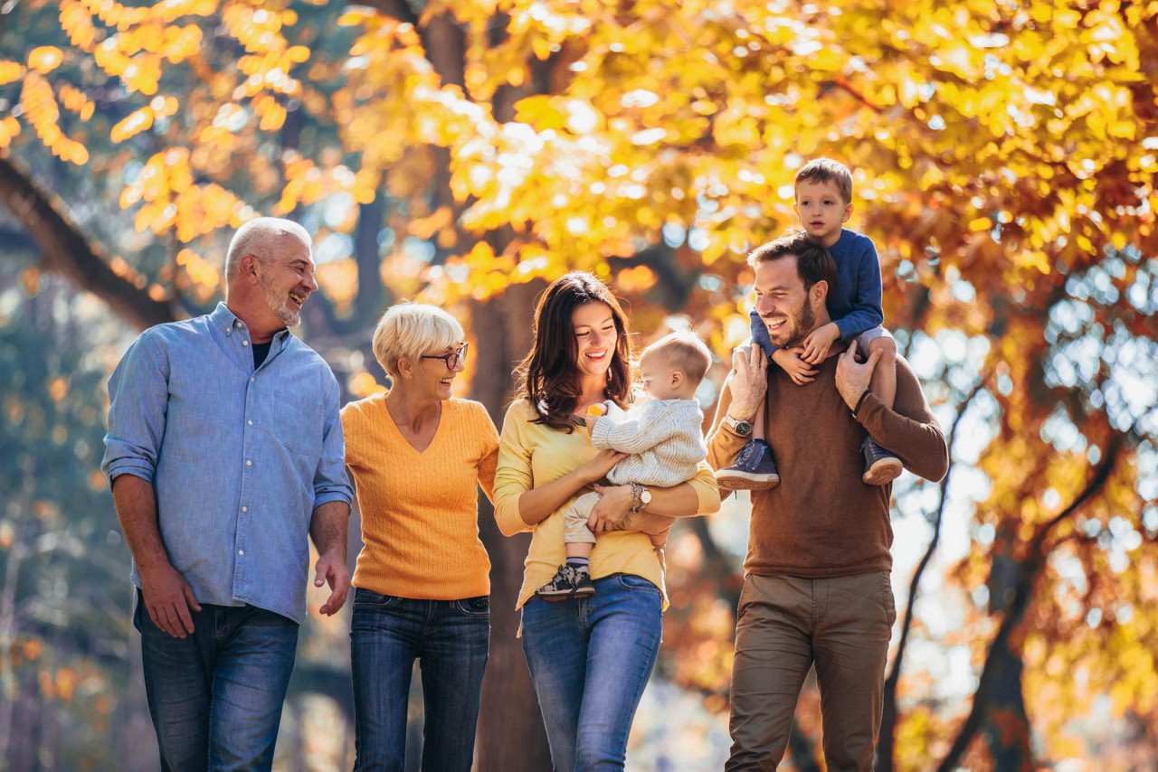 family in autumn, Assure suite for life and wealth | DXC Technology