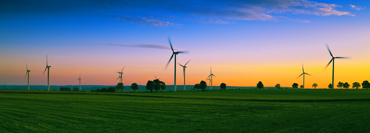 Wind farm on Kashubian, Poland at sunset - Sustainability is AI’s new frontier | DXC Technology Insights