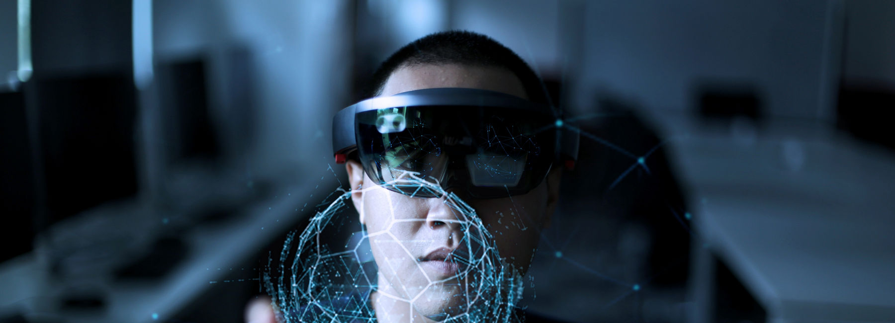 man viewing virtual sphere through virtual reality glasses, Intelligent Collaboration | DXC Technology Insights