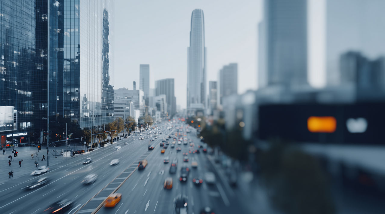 Cityscape at night with overlay of commercial buildings, Commercial & LIfe insurance solutions | DXC Technology