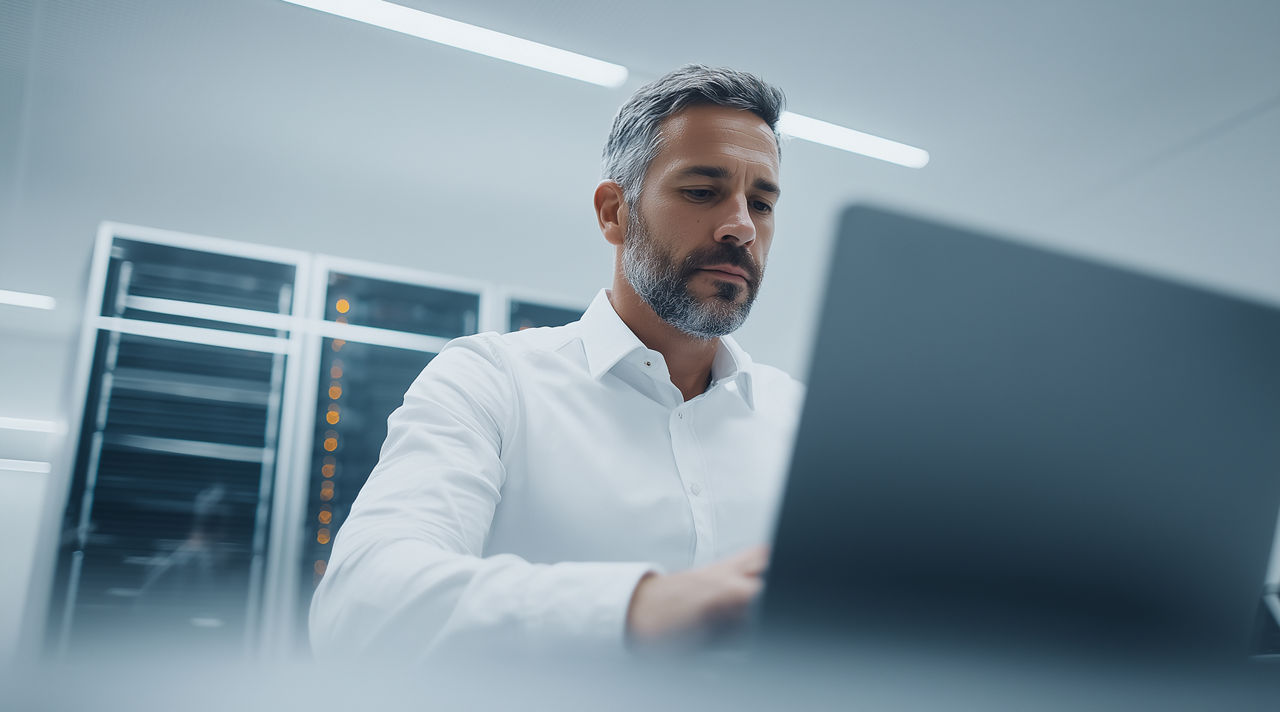 man working on private ai implementation, Private AI | DXC Technology