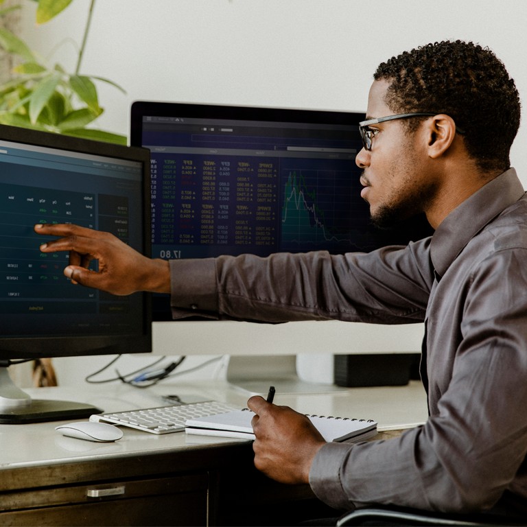 A view of the Scottish countryside with trees and lake - AI agents power the public sector | DXC Technology Insights