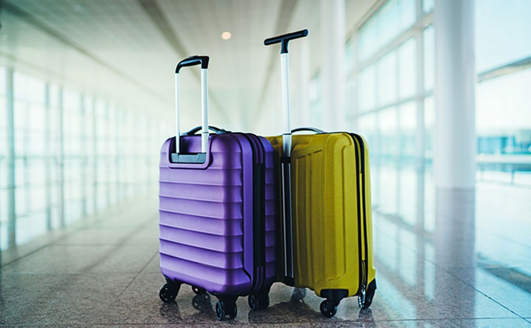 luggage in airport, Cloud & Infrastructure | DXC Technology Customer Story