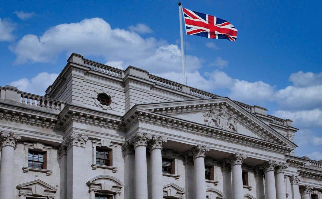 UK Government building flying the Union Jack- Example of Successful Digital Transformation in Healthcare | DXC Customer Story