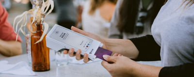 Customer paying with a Clover Flex