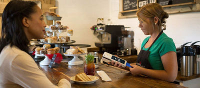 Clover Flex being used at a merchant's counter