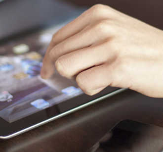 Person using card for tablet