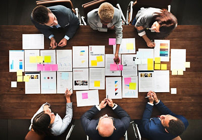 Group of business people gathered at a table