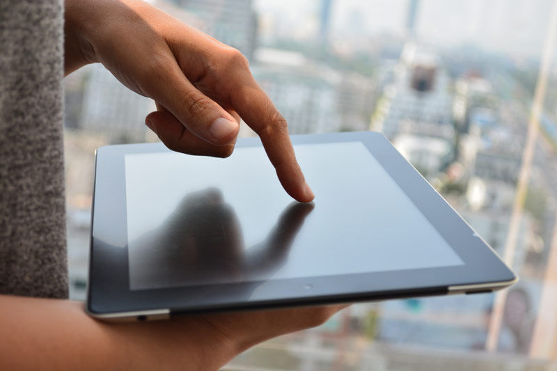 Finger on tablet