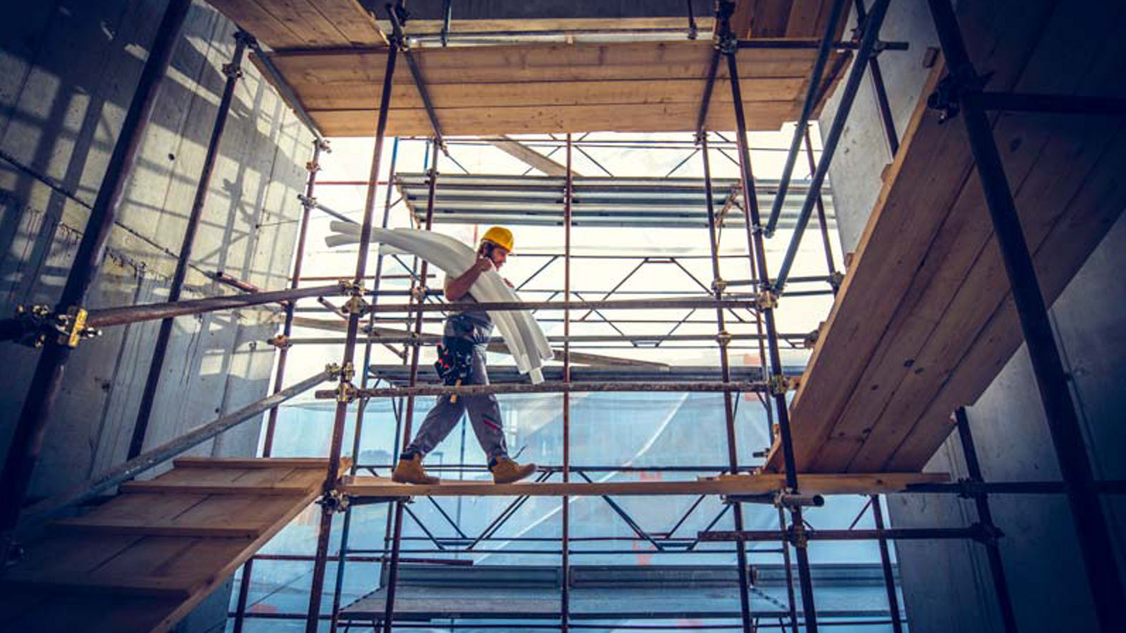 Construction worker on scaffolding