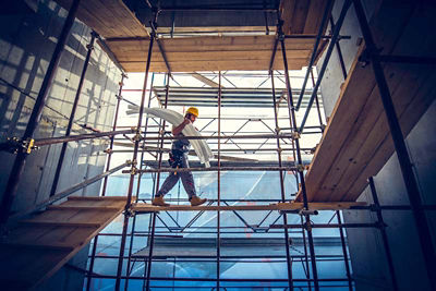 Construction worker on scaffolding