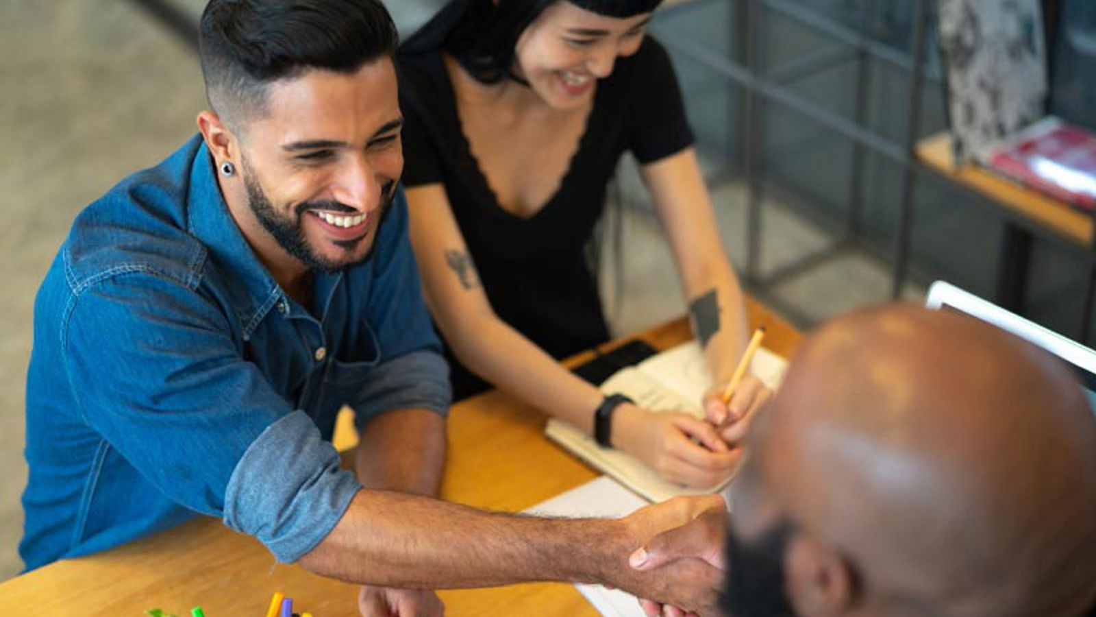 Couple signing for conventional loan
