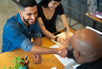 Couple signing for conventional loan