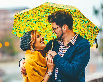 couple under umbrella -savings