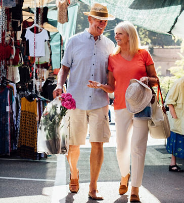 Couple walking in market - Roth IRA