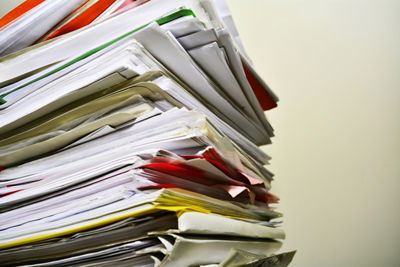 Stack of files on his desk