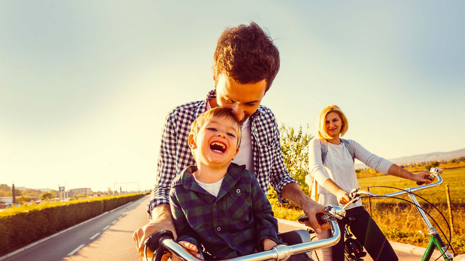 Family riding bikes