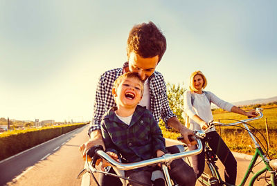 Family riding bikes