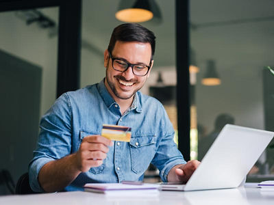 Man looking at Credit card